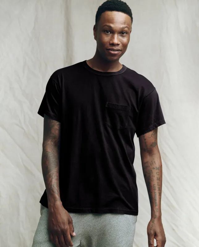 The Men's Pocket Tee. -- Almost Black sold by THE GREAT.