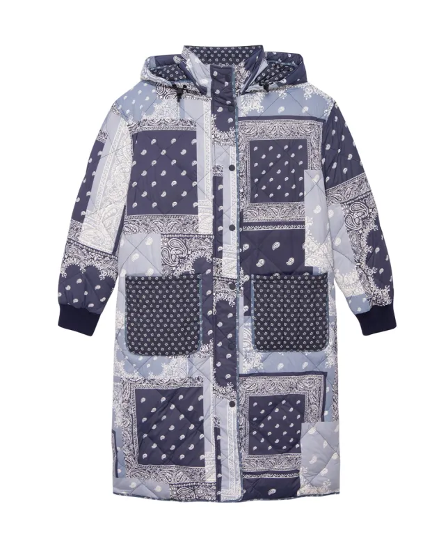 The Reversible Down Storm Puffer. -- Patchwork Bandana and Dewdrop Floral sold by THE GREAT.