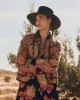 The Quilted Jacket. -- Patchwork Print sold by THE GREAT.