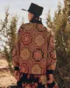 The Quilted Jacket. -- Patchwork Print sold by THE GREAT.