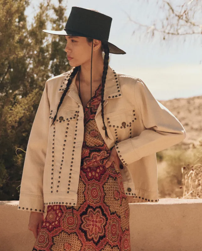 The Studded Slouchy Jean Jacket. -- Natural sold by THE GREAT.