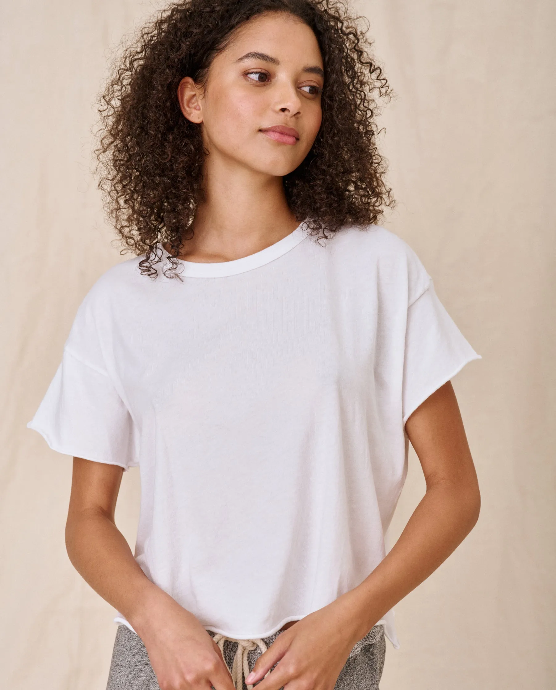 The Crop Tee. Solid -- True White sold by THE GREAT.