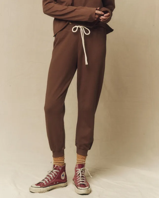 The Cropped Sweatpant. Solid -- Hickory sold by THE GREAT.