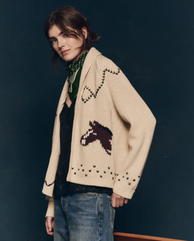 The Horse Lodge Cardigan. -- Cream sold by THE GREAT.