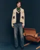 The Horse Lodge Cardigan. -- Cream sold by THE GREAT.