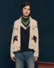 The Horse Lodge Cardigan. -- Cream sold by THE GREAT.