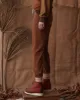 The Stadium Sweatpant. Solid -- Heritage Brown sold by THE GREAT.