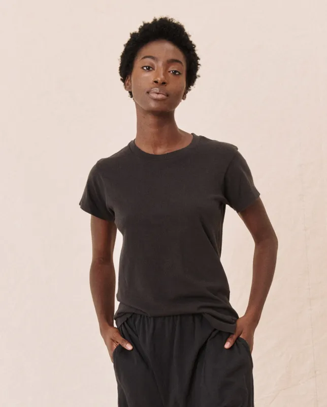 The Slim Tee. Solid -- Almost Black sold by THE GREAT.