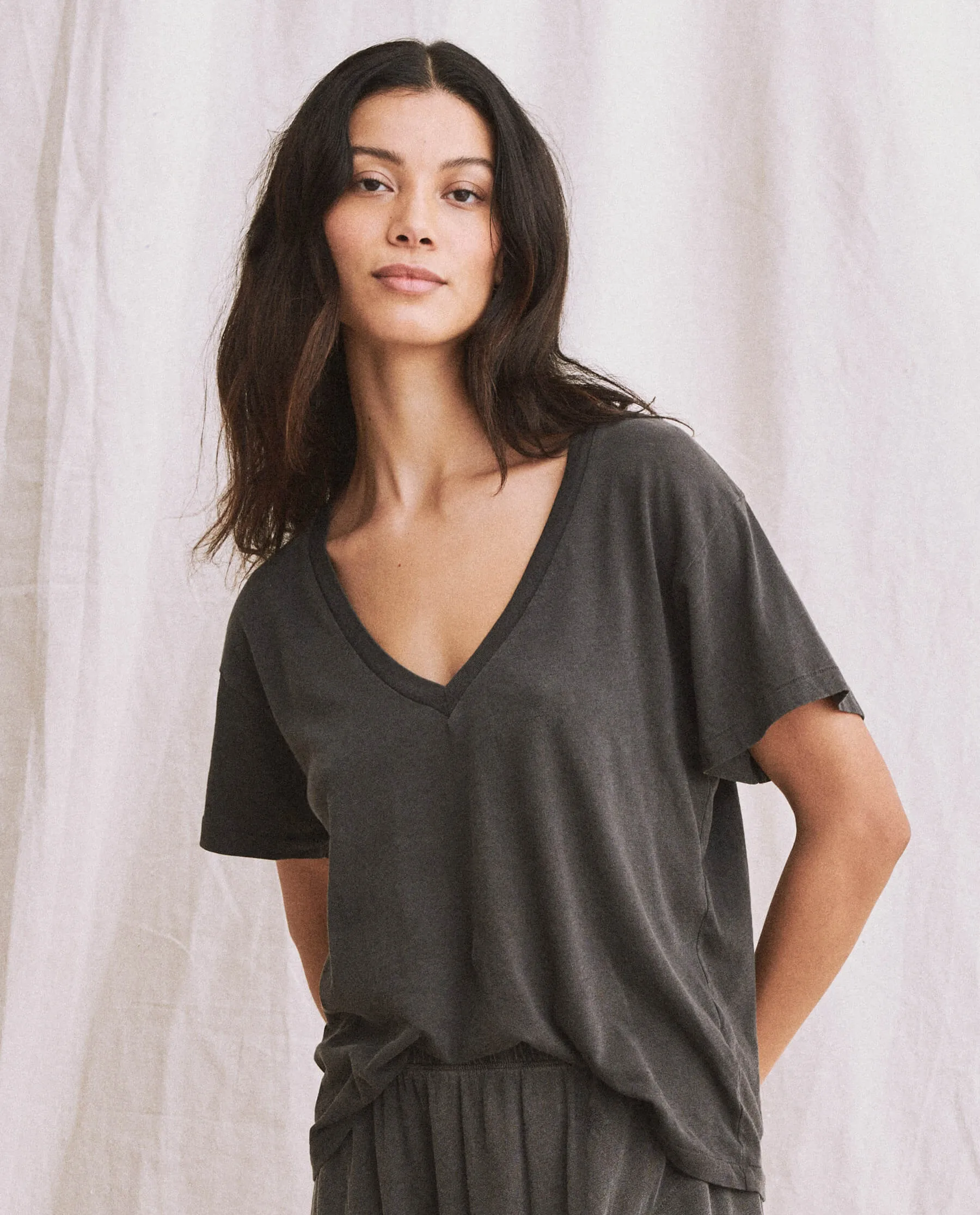 The V-Neck Tee. -- Washed Black sold by THE GREAT.