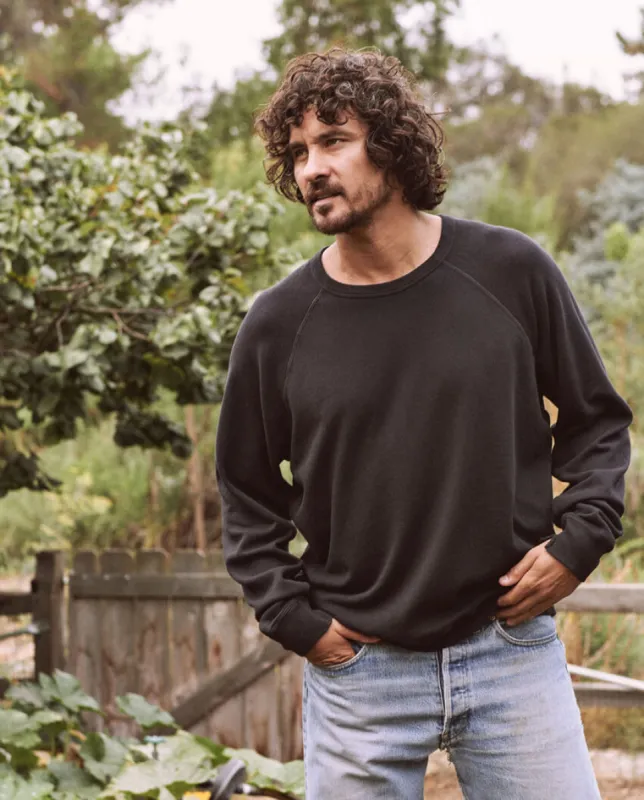 The Men's College Sweatshirt. -- ALMOST BLACK sold by THE GREAT.