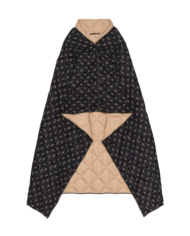 The Wearable Reversible Puffer Blanket. -- Wilderness Floral and Powder Pink sold by THE GREAT.