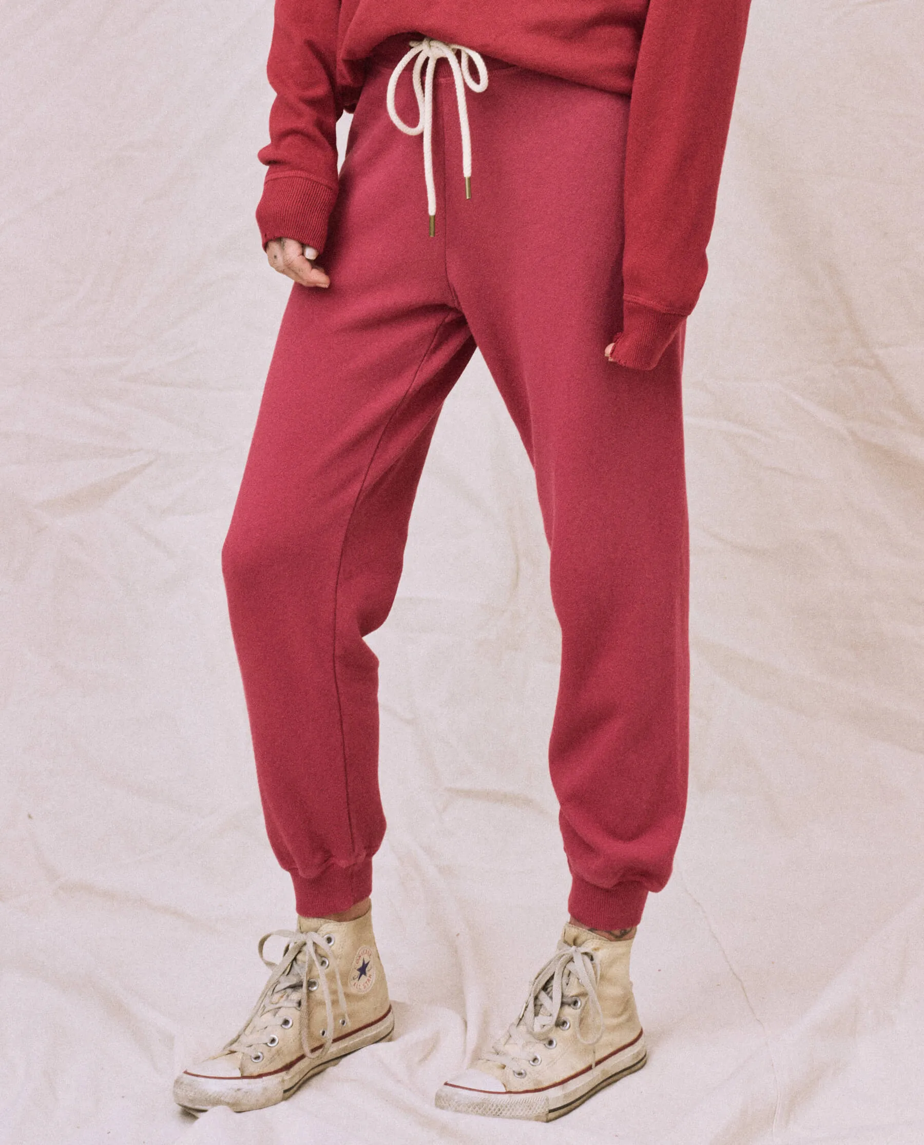 The Cropped Sweatpant. Solid -- Sweet Plum sold by THE GREAT.
