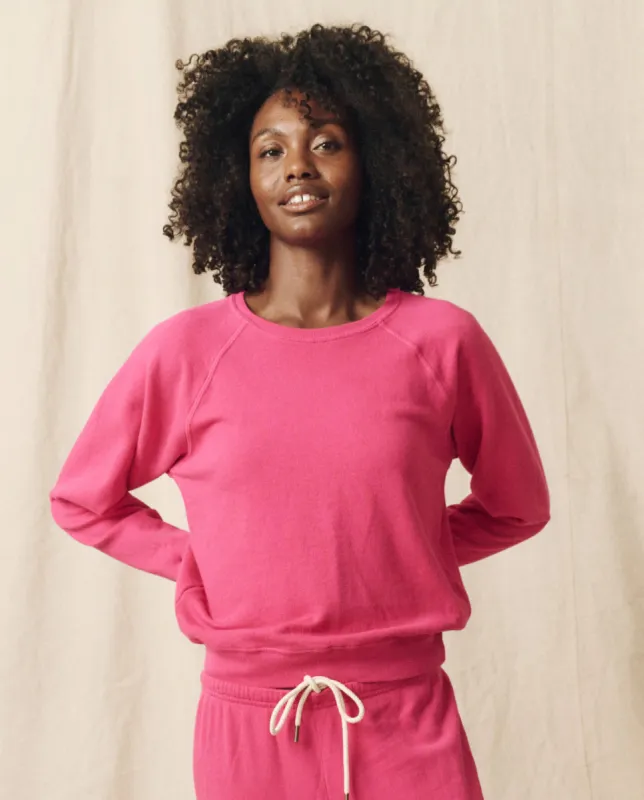 The Shrunken Sweatshirt. Solid -- Fuchsia sold by THE GREAT.