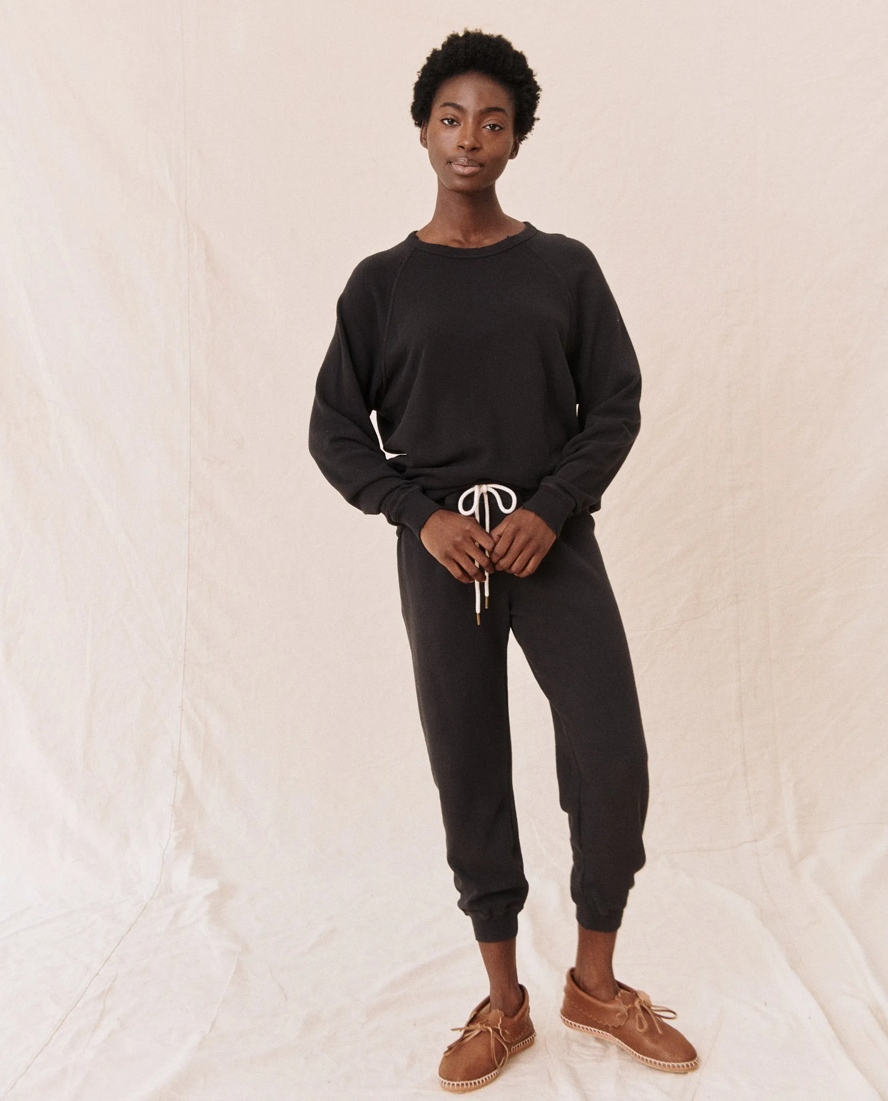 The Cropped Sweatpant. Solid -- Almost Black sold by THE GREAT. product image thumbnail 3