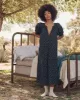 The Smocked Sleep Dress. -- Nightshade Floral sold by THE GREAT.