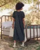 The Smocked Sleep Dress. -- Nightshade Floral sold by THE GREAT.