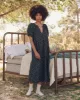 The Smocked Sleep Dress. -- Nightshade Floral sold by THE GREAT.