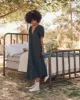 The Smocked Sleep Dress. -- Nightshade Floral sold by THE GREAT.