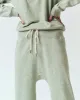 The Relay Sweatpant. -- Heathered Bright Pine sold by THE GREAT.