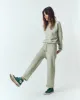 The Relay Sweatpant. -- Heathered Bright Pine sold by THE GREAT.