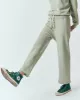 The Relay Sweatpant. -- Heathered Bright Pine sold by THE GREAT.