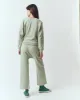 The Relay Sweatpant. -- Heathered Bright Pine sold by THE GREAT.