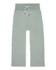 The Relay Sweatpant. -- Heathered Bright Pine sold by THE GREAT.