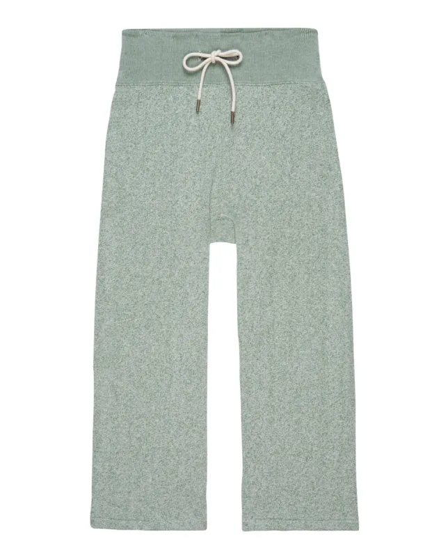 The Relay Sweatpant. -- Heathered Bright Pine sold by THE GREAT.