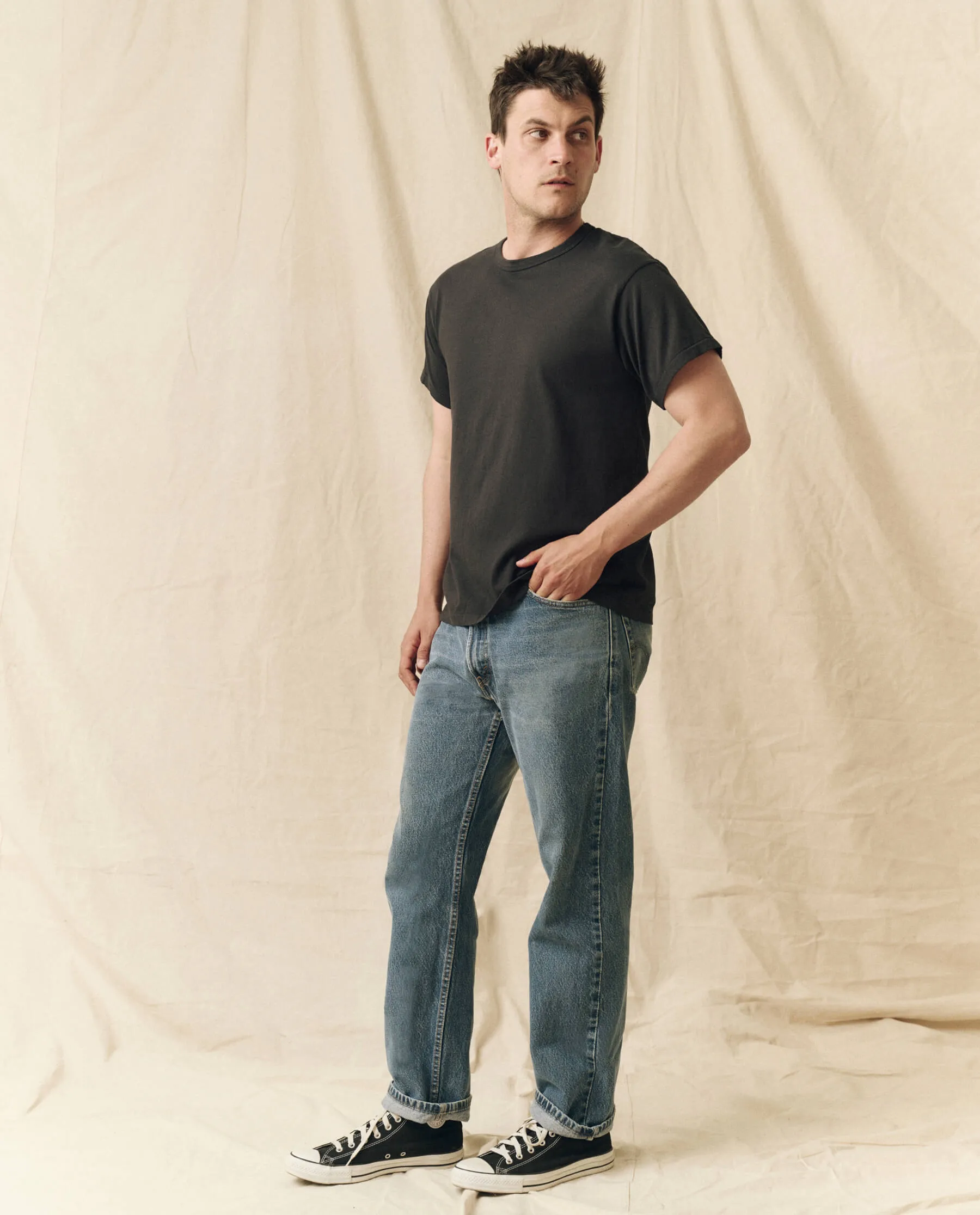 The Men's Pure Knits Boxy Crew. Solid -- Almost Black sold by THE GREAT.