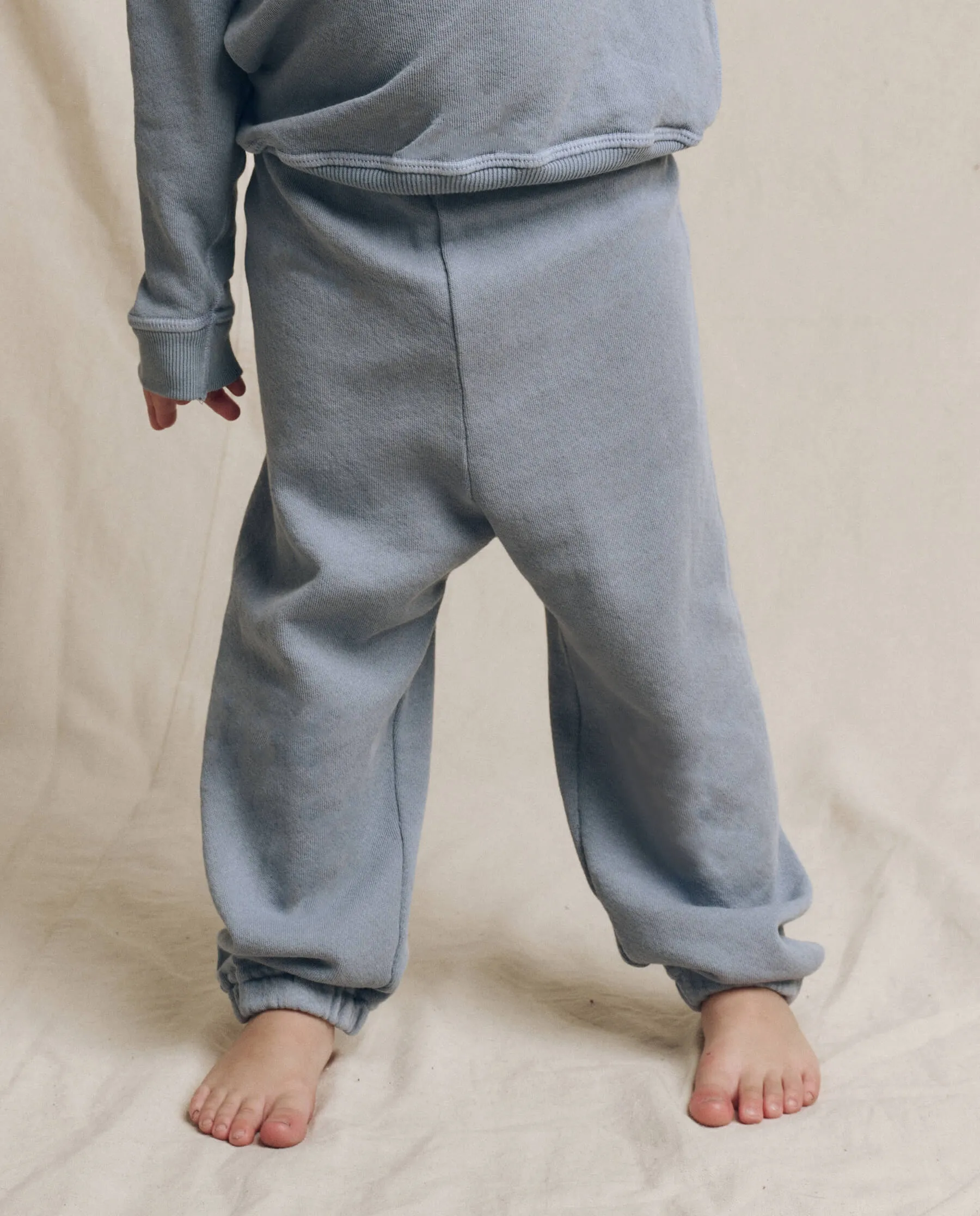 The Little Stadium Sweatpant. Solid -- Big Sky sold by THE GREAT.