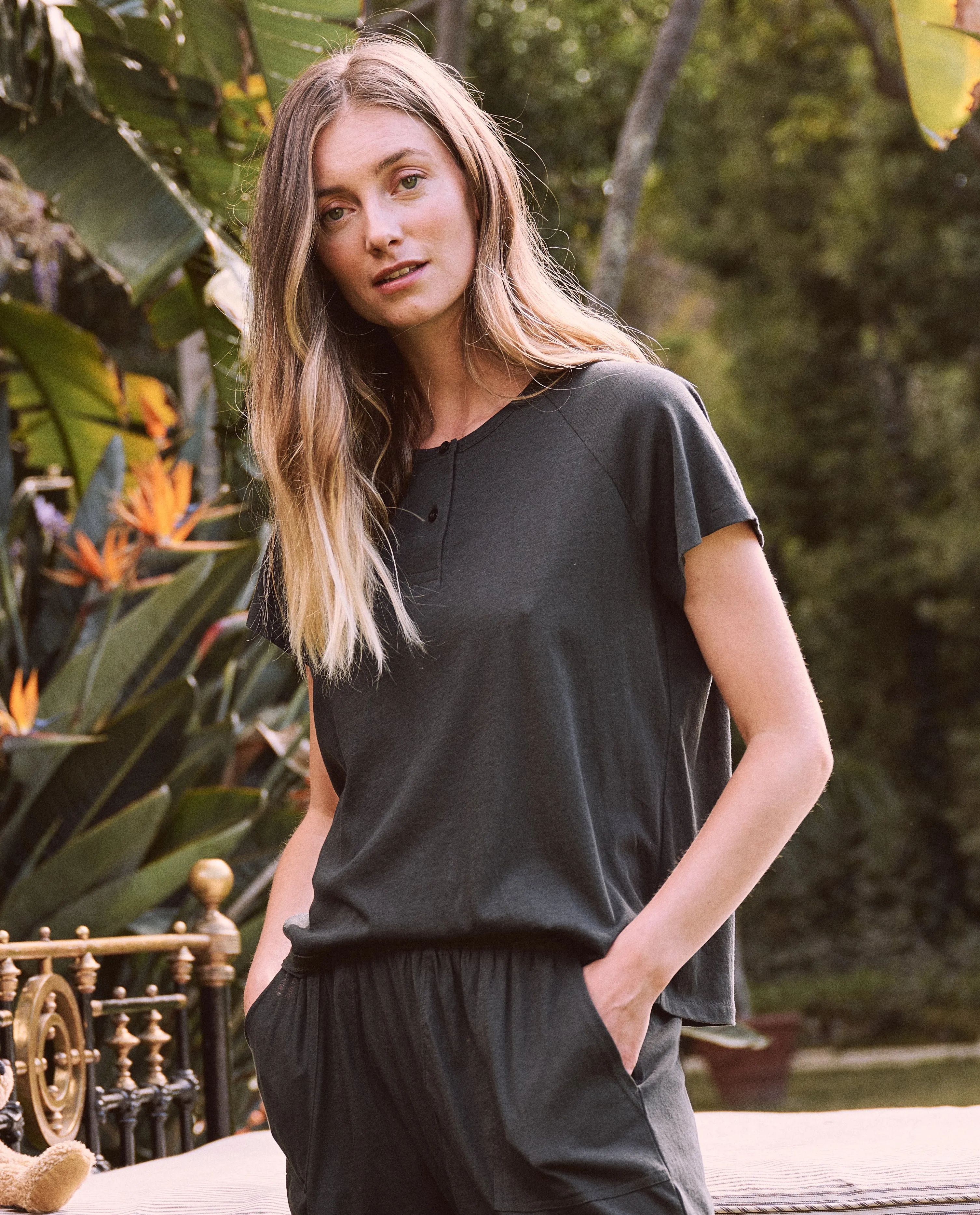 The Raglan Sleep Henley. -- Black sold by THE GREAT.