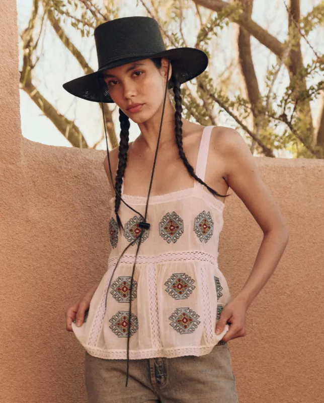 The Roam Top with Folklore Embroidery. -- Cream sold by THE GREAT.