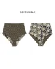 The Reversible Mid-Rise Brief. -- Black Oasis Floral and Bronze Check sold by THE GREAT.