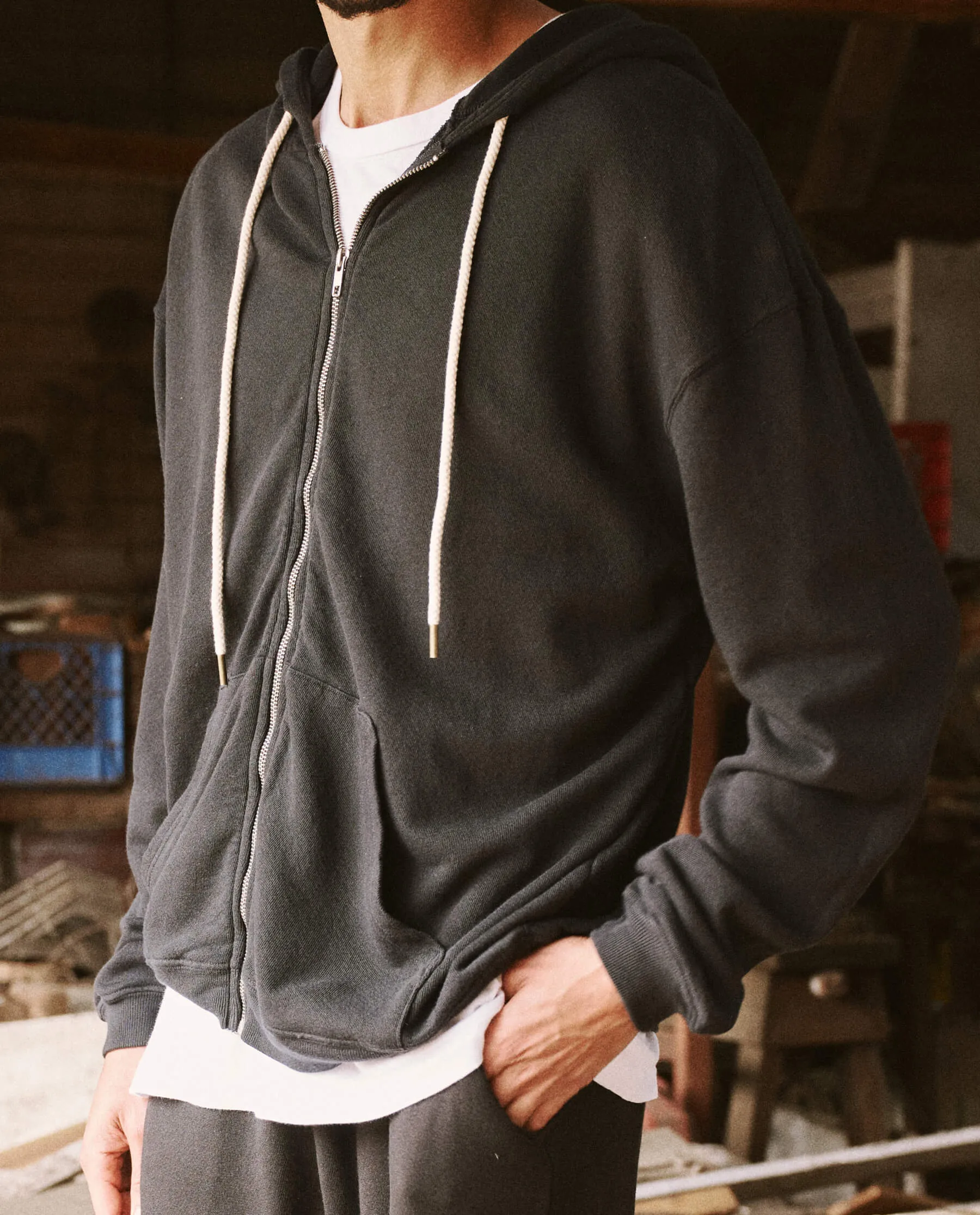 The Men's Zip Up Hoodie. -- Almost Black sold by THE GREAT.