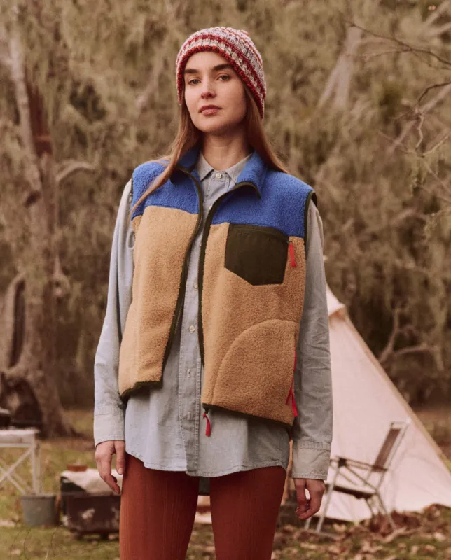 The Plush Colorblock Terrain Vest. -- Ocean Blue and Fawn sold by THE GREAT.
