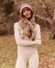 The Down Quilted Puffer Scarf. -- Snow Leopard sold by THE GREAT.