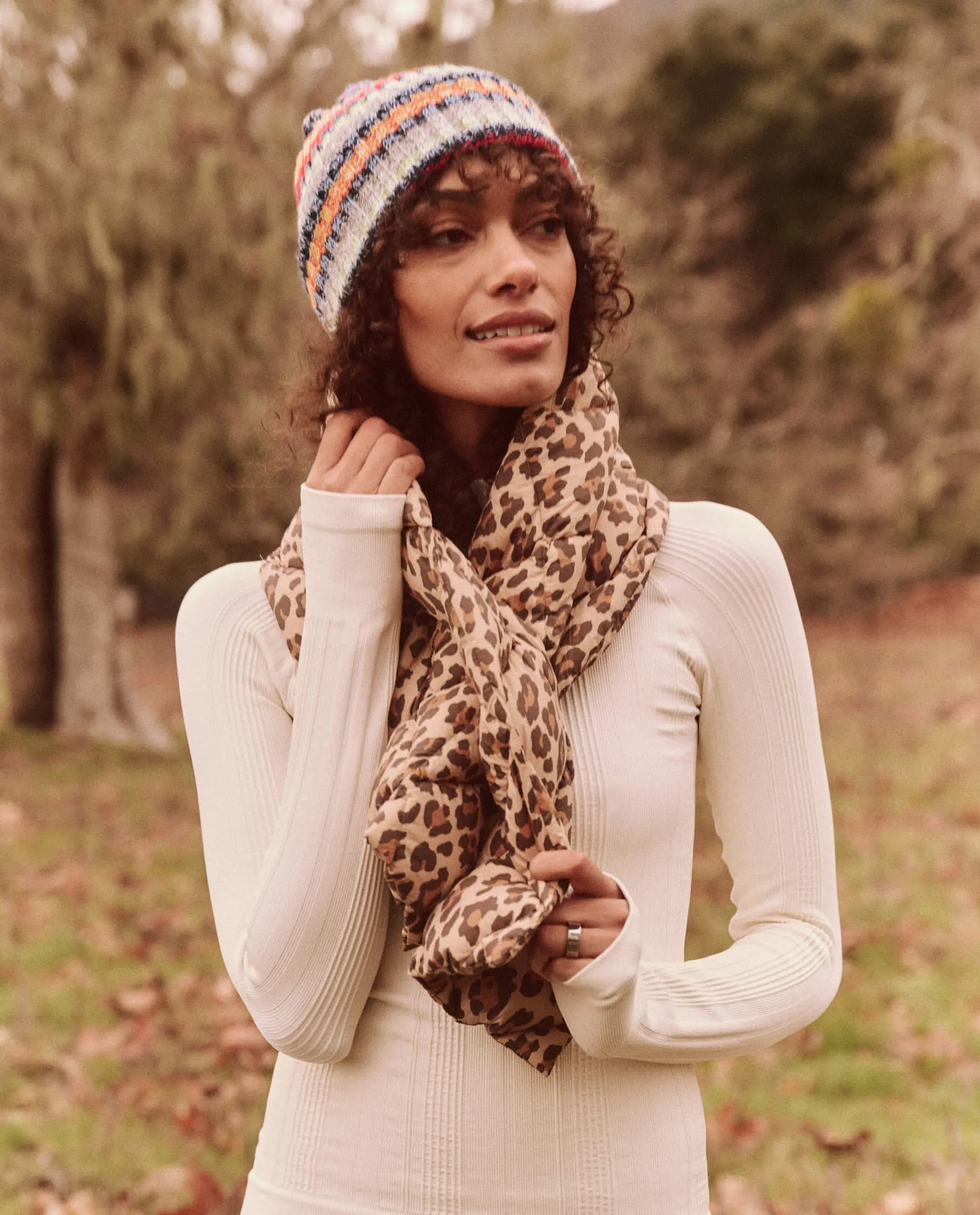 The Down Quilted Puffer Scarf. -- Snow Leopard sold by THE GREAT.