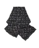 The Down Quilted Puffer Scarf. -- Wilderness Floral sold by THE GREAT.
