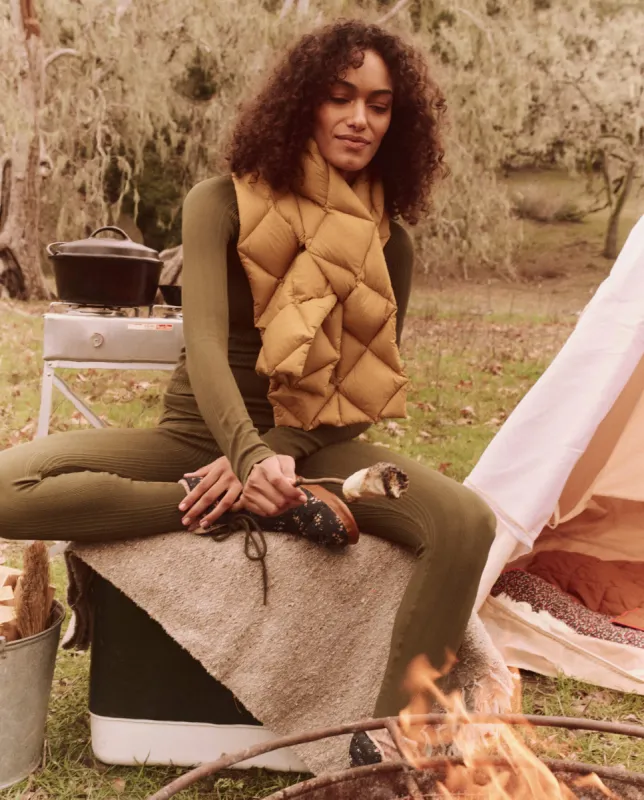 The Down Quilted Puffer Scarf. -- Goldenrod sold by THE GREAT.