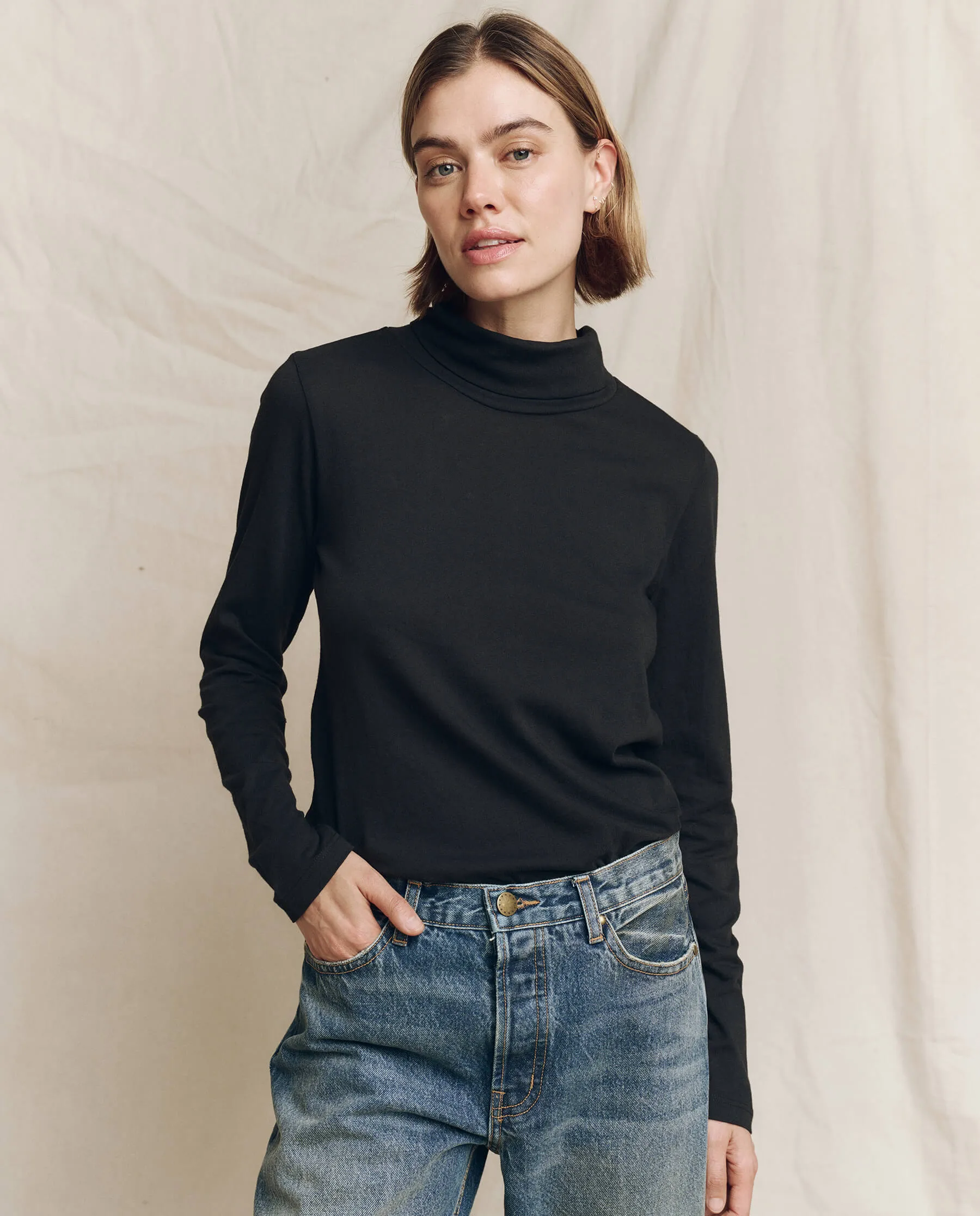 The Turtleneck. Solid -- Almost Black sold by THE GREAT.