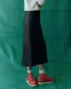 The Leather Column Skirt. -- Black sold by THE GREAT.