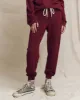 The Cropped Sweatpant. Solid -- Plum sold by THE GREAT.