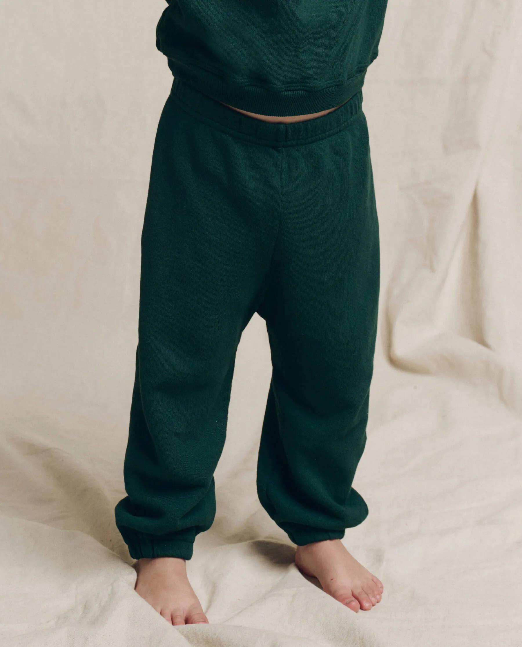 The Little Stadium Sweatpant. Solid -- Pinyon sold by THE GREAT.