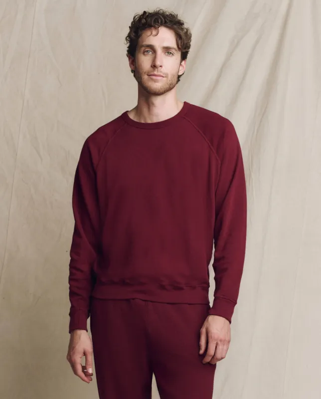 The Men's College Sweatshirt. Solid -- Plum sold by THE GREAT.