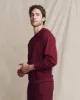 The Men's College Sweatshirt. Solid -- Plum sold by THE GREAT.