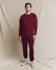 The Men's College Sweatshirt. Solid -- Plum sold by THE GREAT.