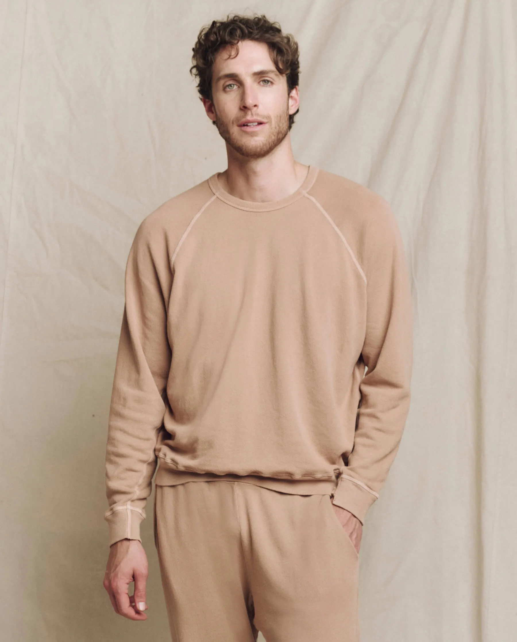 The Men's College Sweatshirt. Solid -- Biscotti sold by THE GREAT.