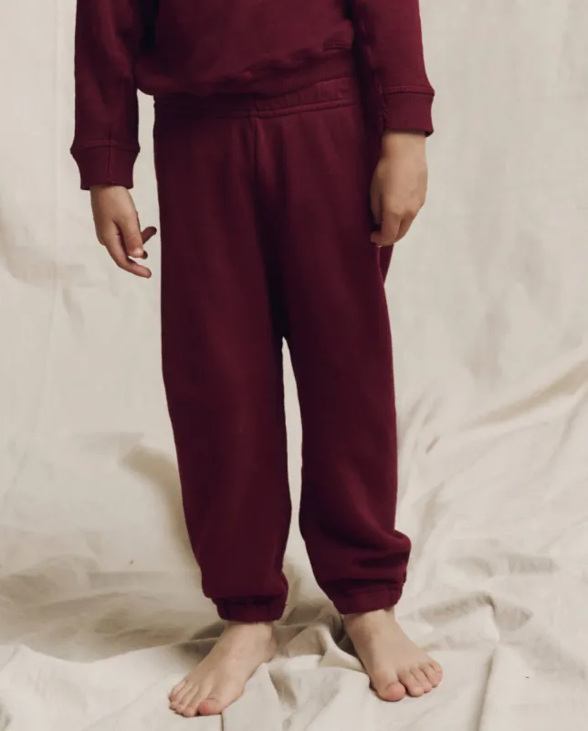 The Little Stadium Sweatpant. Solid -- Plum sold by THE GREAT.