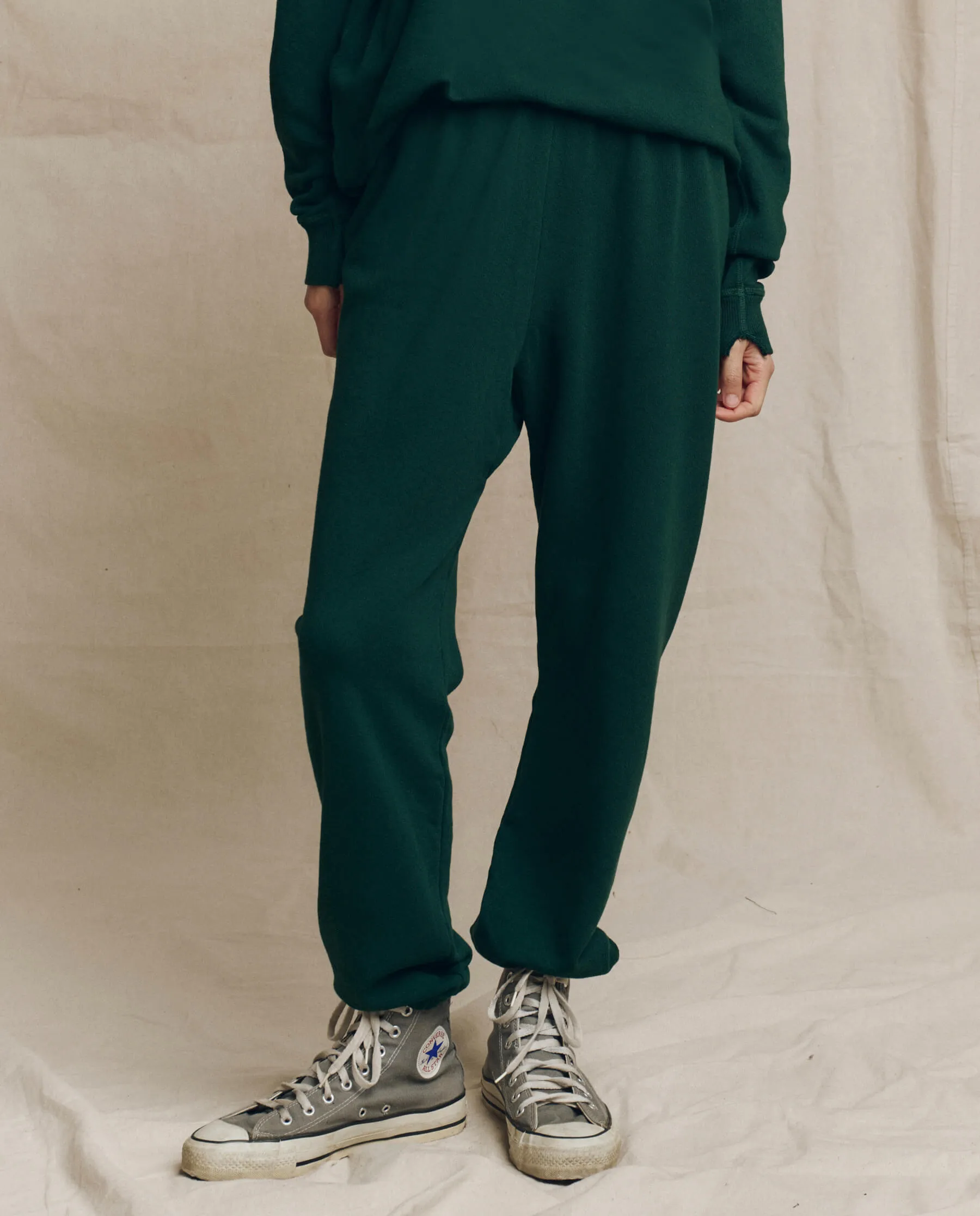 The Stadium Sweatpant. Solid -- Pinyon sold by THE GREAT.