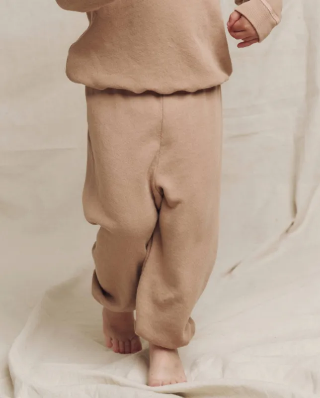 The Little Stadium Sweatpant. Solid -- Biscotti sold by THE GREAT.